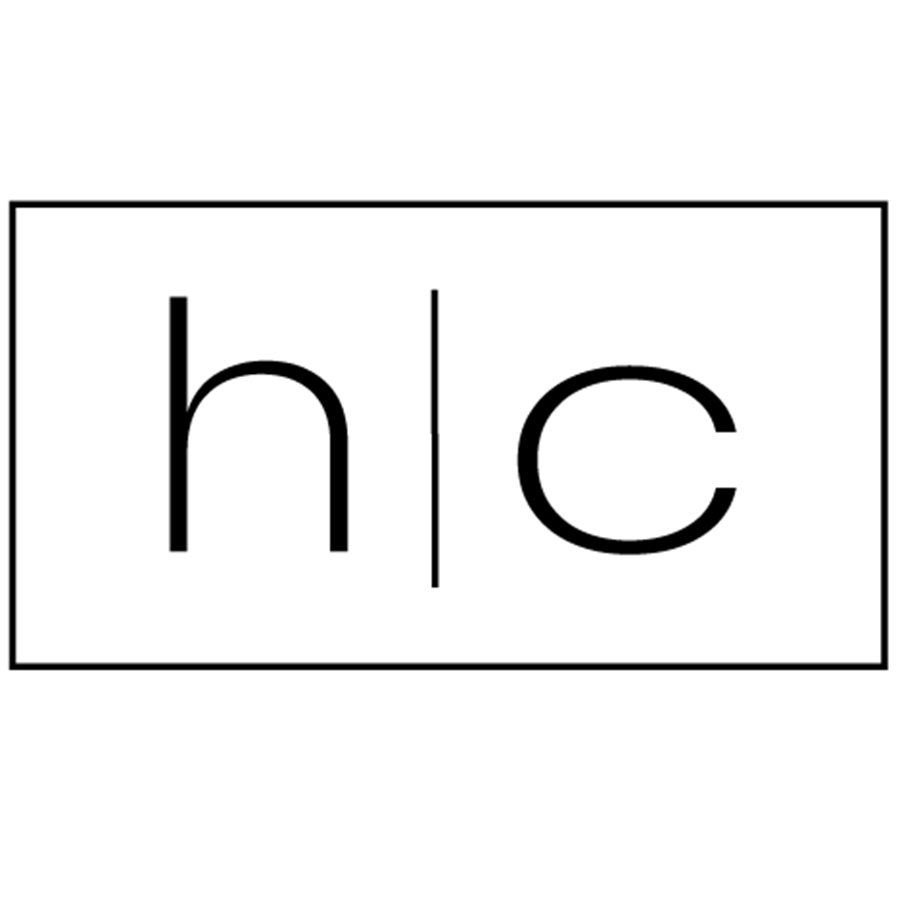 A black-and-white diagram showing the chemical element symbols for Hydrogen (h) and Carbon (c) separated by a vertical line within a rectangle.