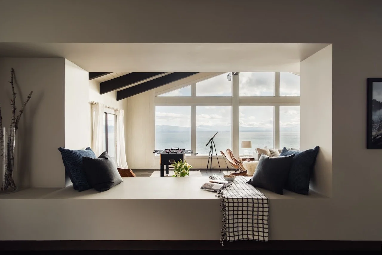 Lake Tahoe lakefront &mdash; interior looking through architectural window frame to the lake