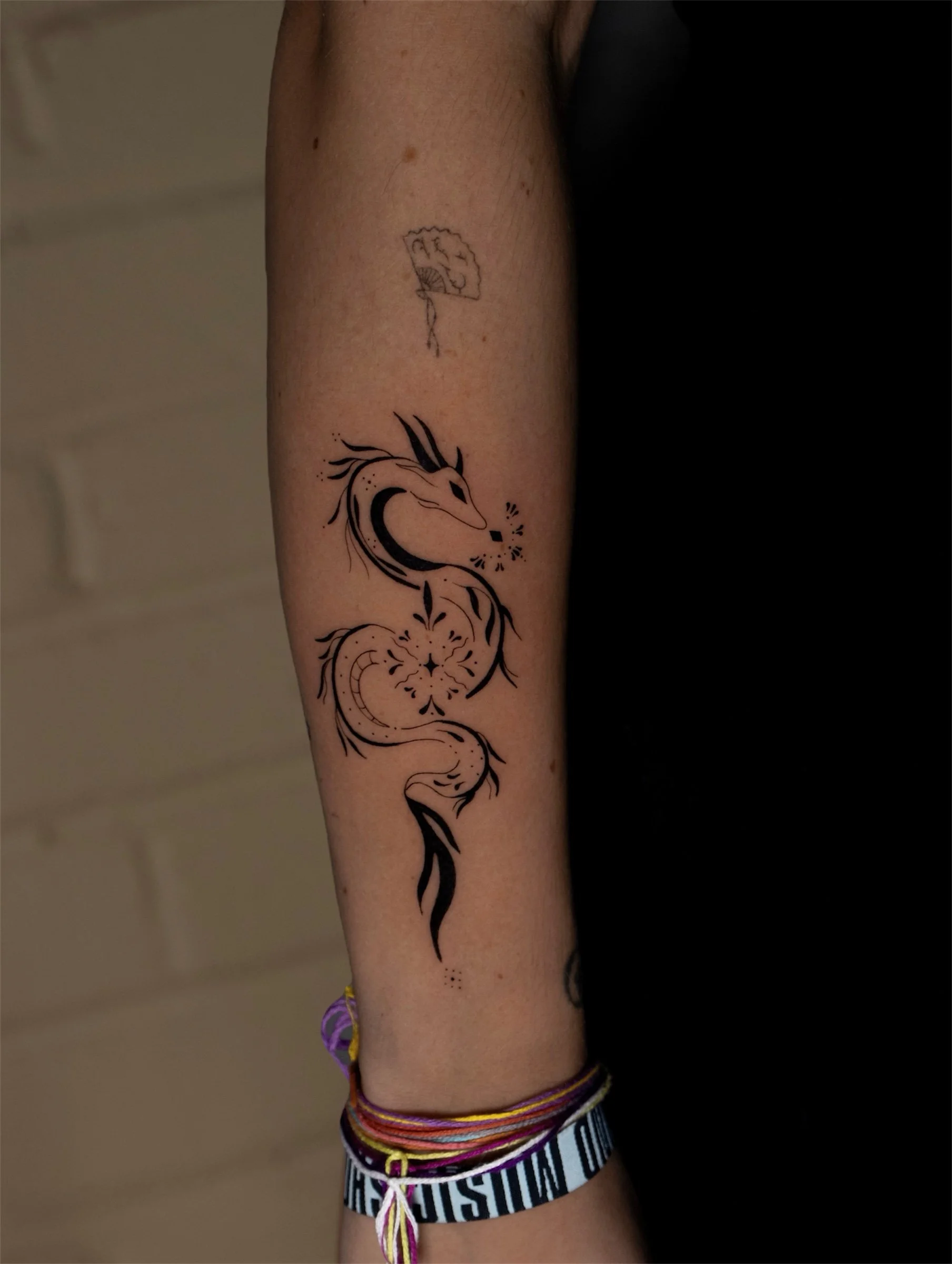 Small fine line tattoo created by Erica Inagaki in Denver Colorado