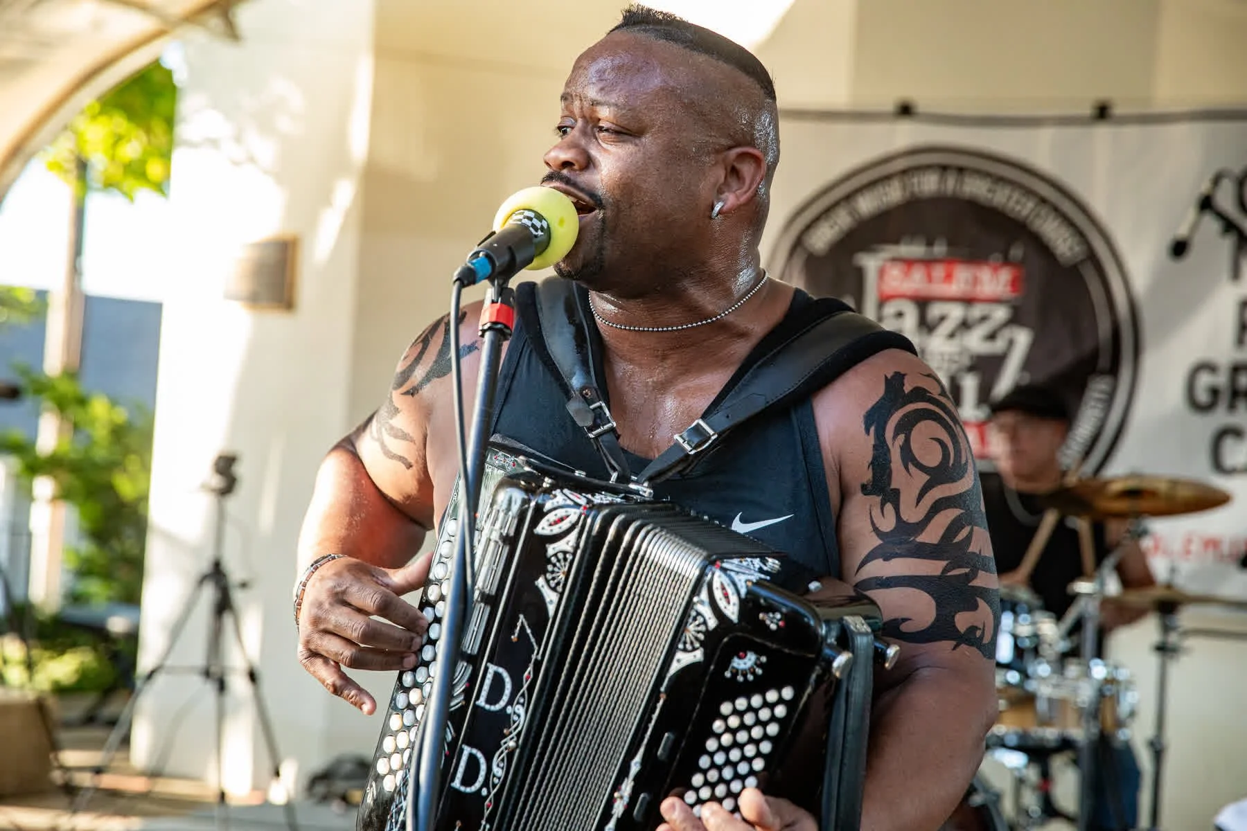 Dwayne Dopsie sings and plays accordion with the Zydeco Hellraisers at Salem Willows.