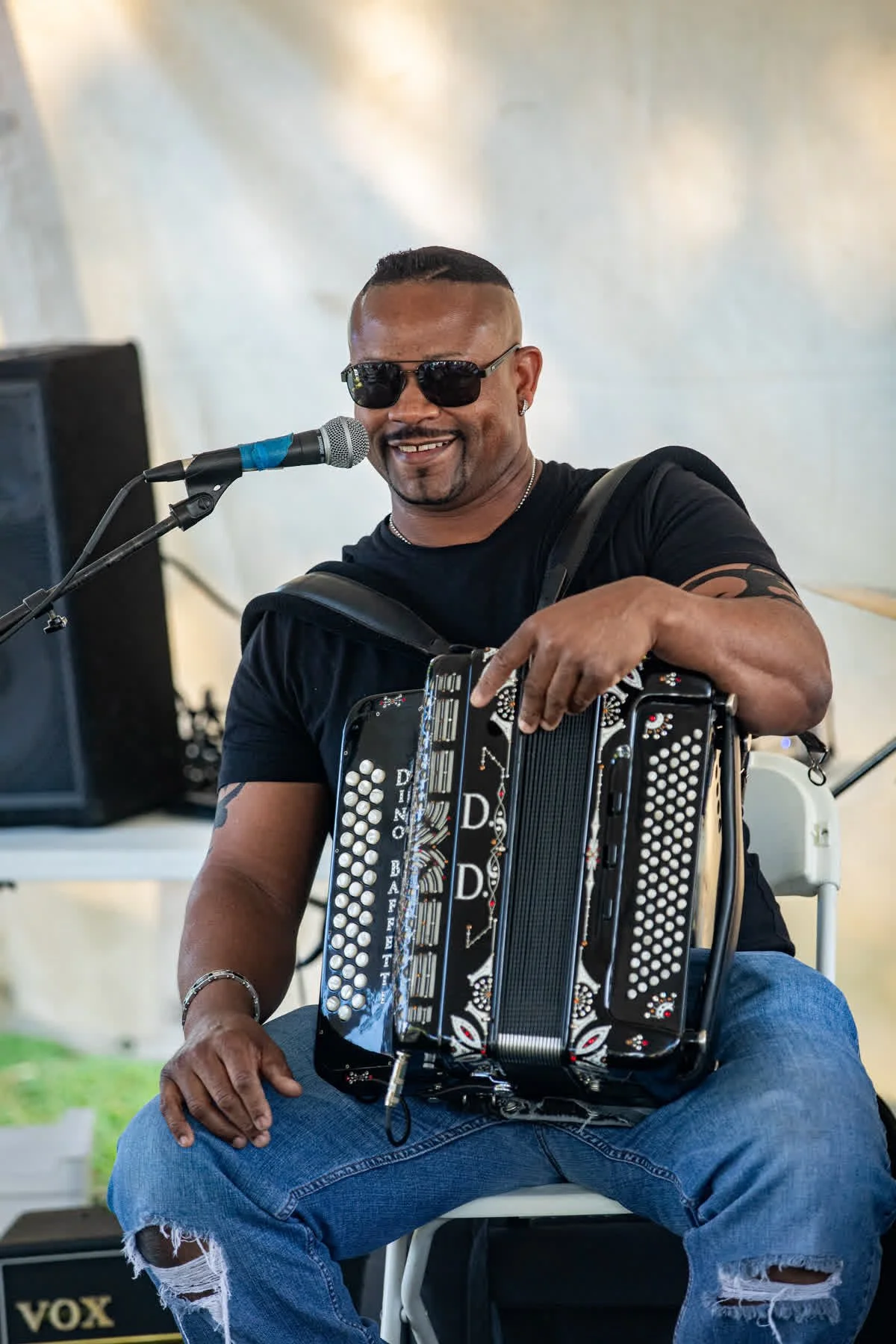 Dwayne Dopsie leads a free zydeco music and culture workshop in the Education Tent at Salem Willows.
