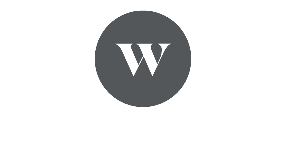 Logo for Wealthsimple featuring a gray circle with a white 'W' and the word 'Wealthsimple' underneath.
