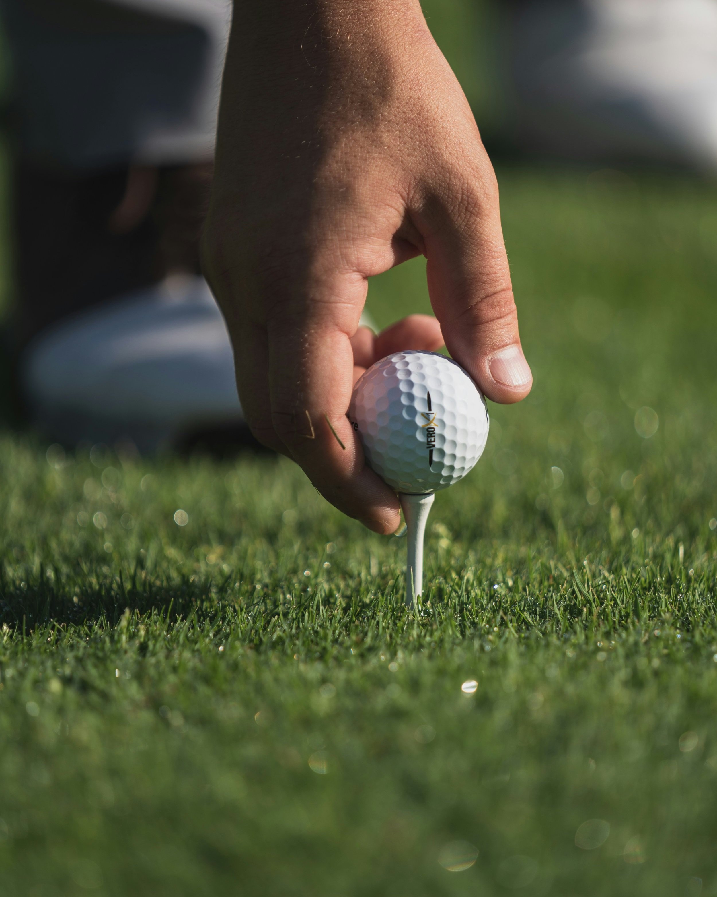Person+Holding+Golf+Ball.jpg