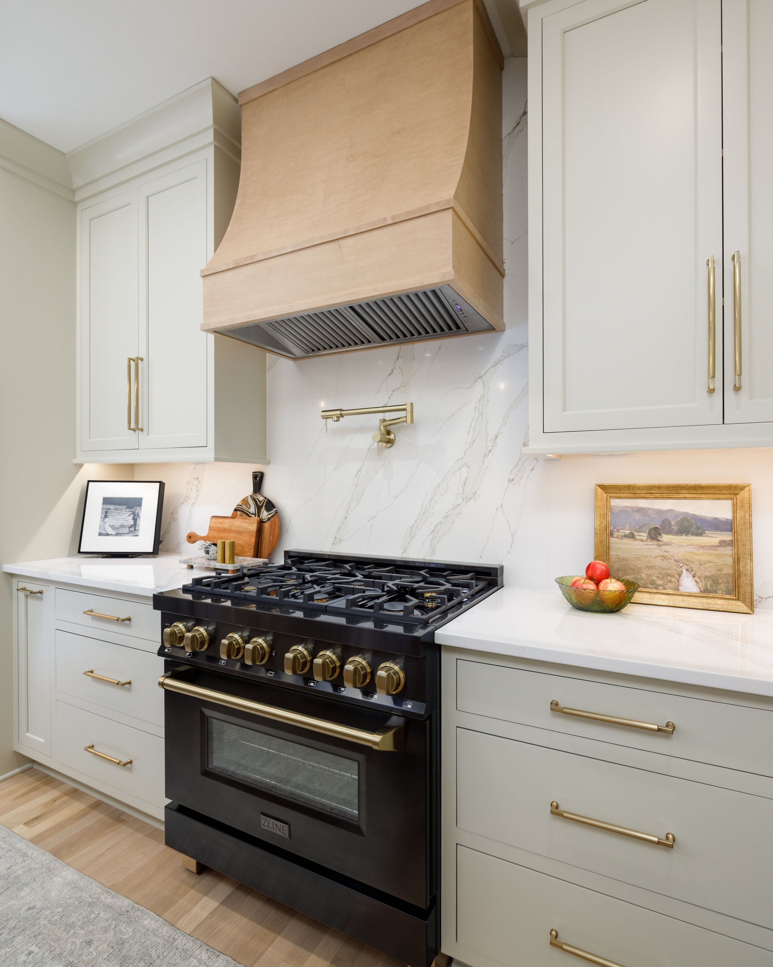 Quartz backsplash, inset cabinetry