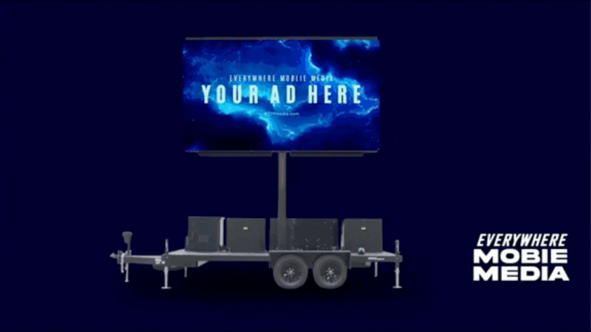Mobile advertising trailer with a large digital screen displaying the message 'Your Ad Here' and the text 'Everywhere Mobile' and 'Media' on the bottom right.