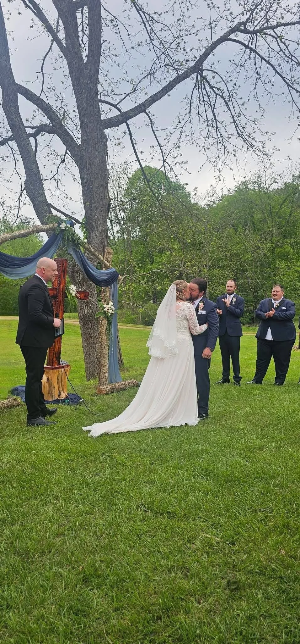 Spring Wedding - The first kiss, reception held on the lawn