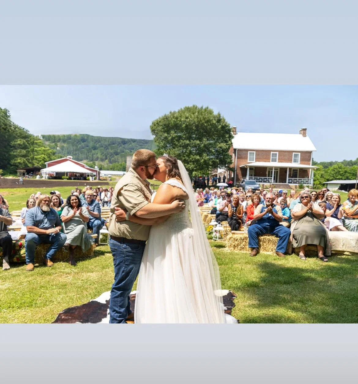 First kiss at a beautiful Spring wedding