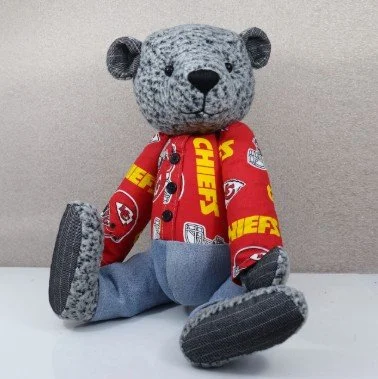 Large dressed bear made from preloved sweatshirt and jeans and thrifted fabric © 2024