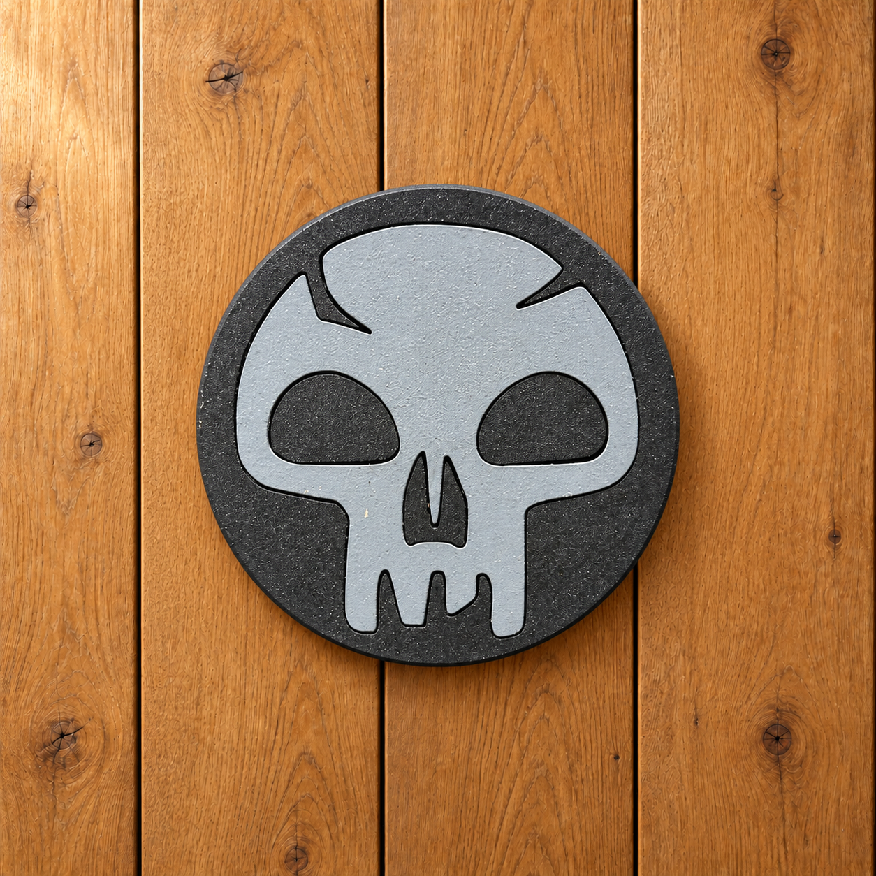 Gray skull magnet on oak-6.png