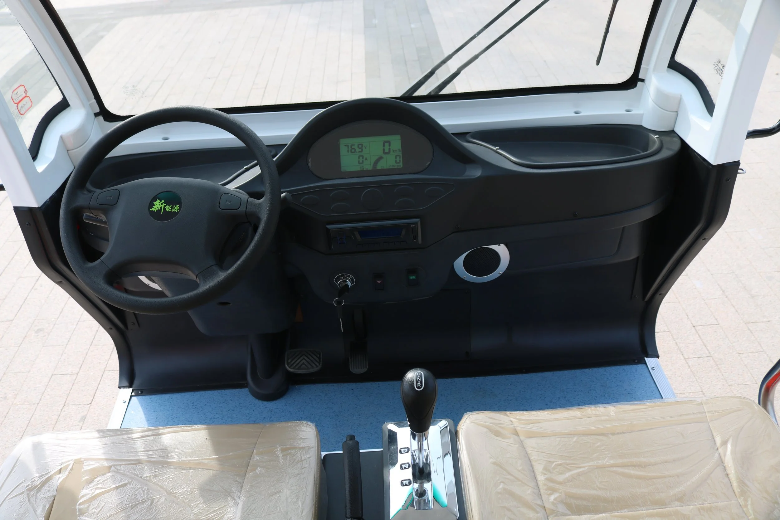 close up of dash in a 17 passenger low speed vehicle or mini bus