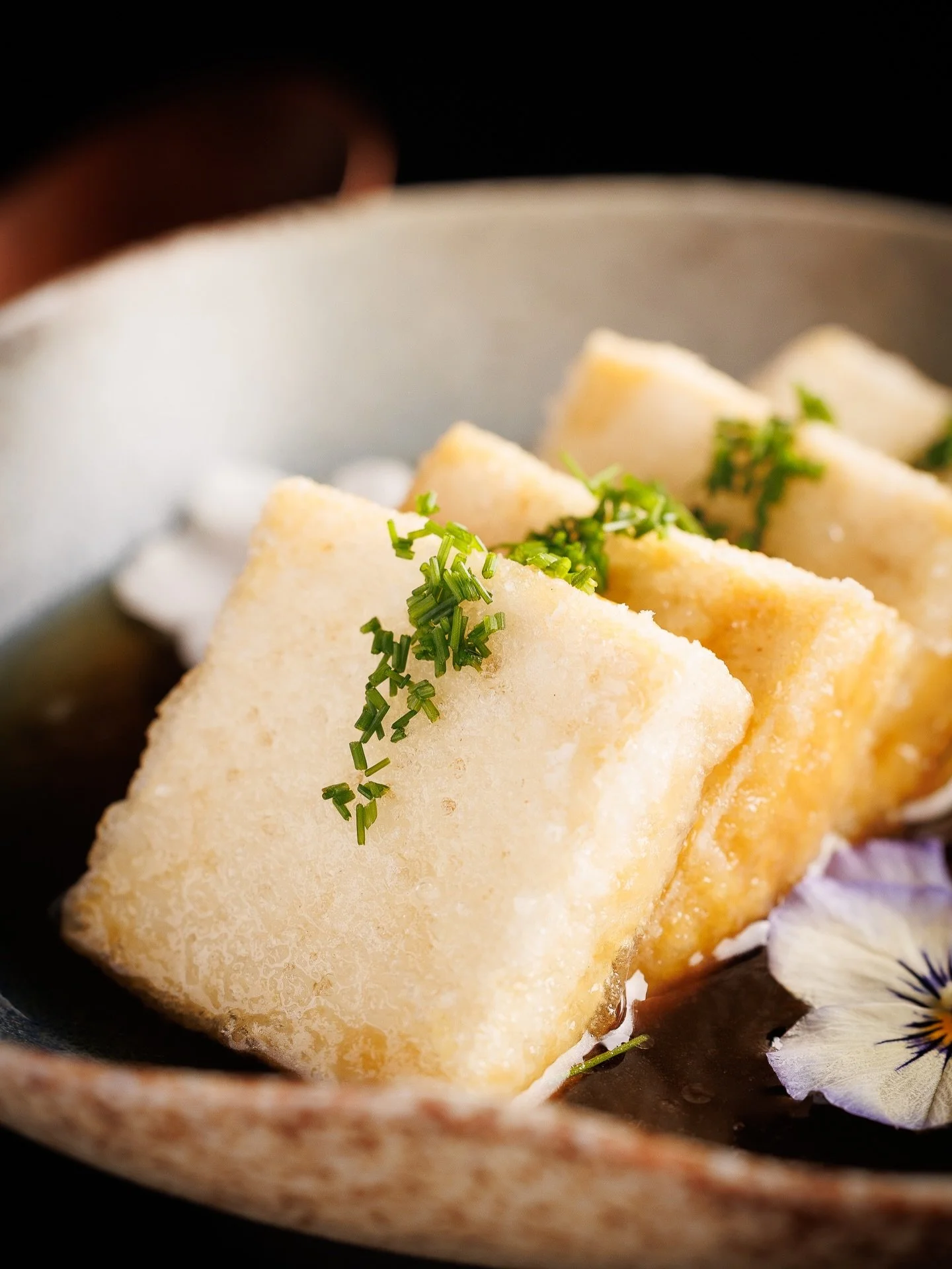 Crispy on the outside, silken on the inside, and bathed in a soul-warming dashi broth. Our Agedashi Tofu is a masterclass in texture&mdash;crafted with care to ensure every bite is as unforgettable as the last. 🥢
Looking for the perfect partner? Our
