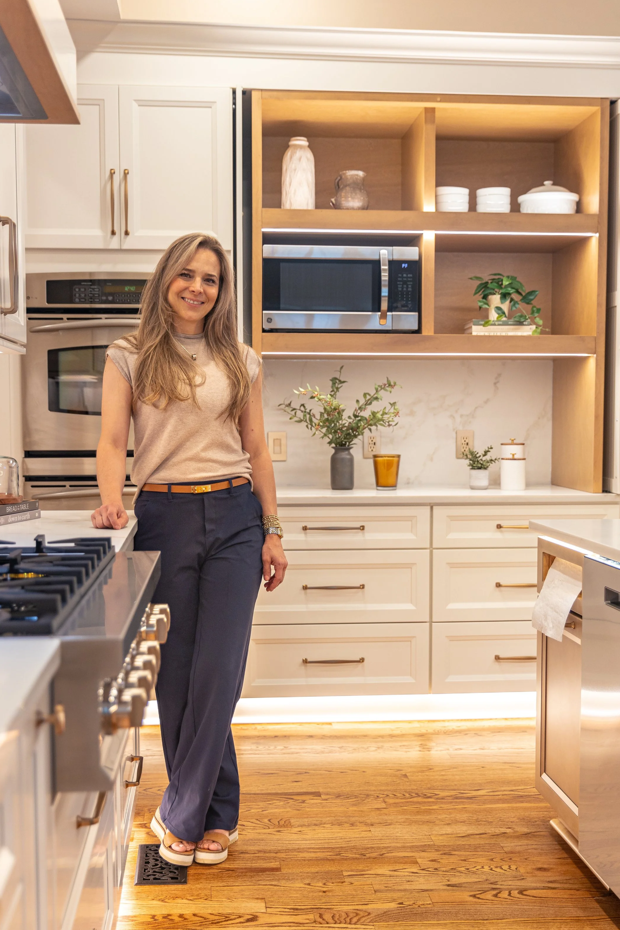 photo of Karla standing in newly remodeled home