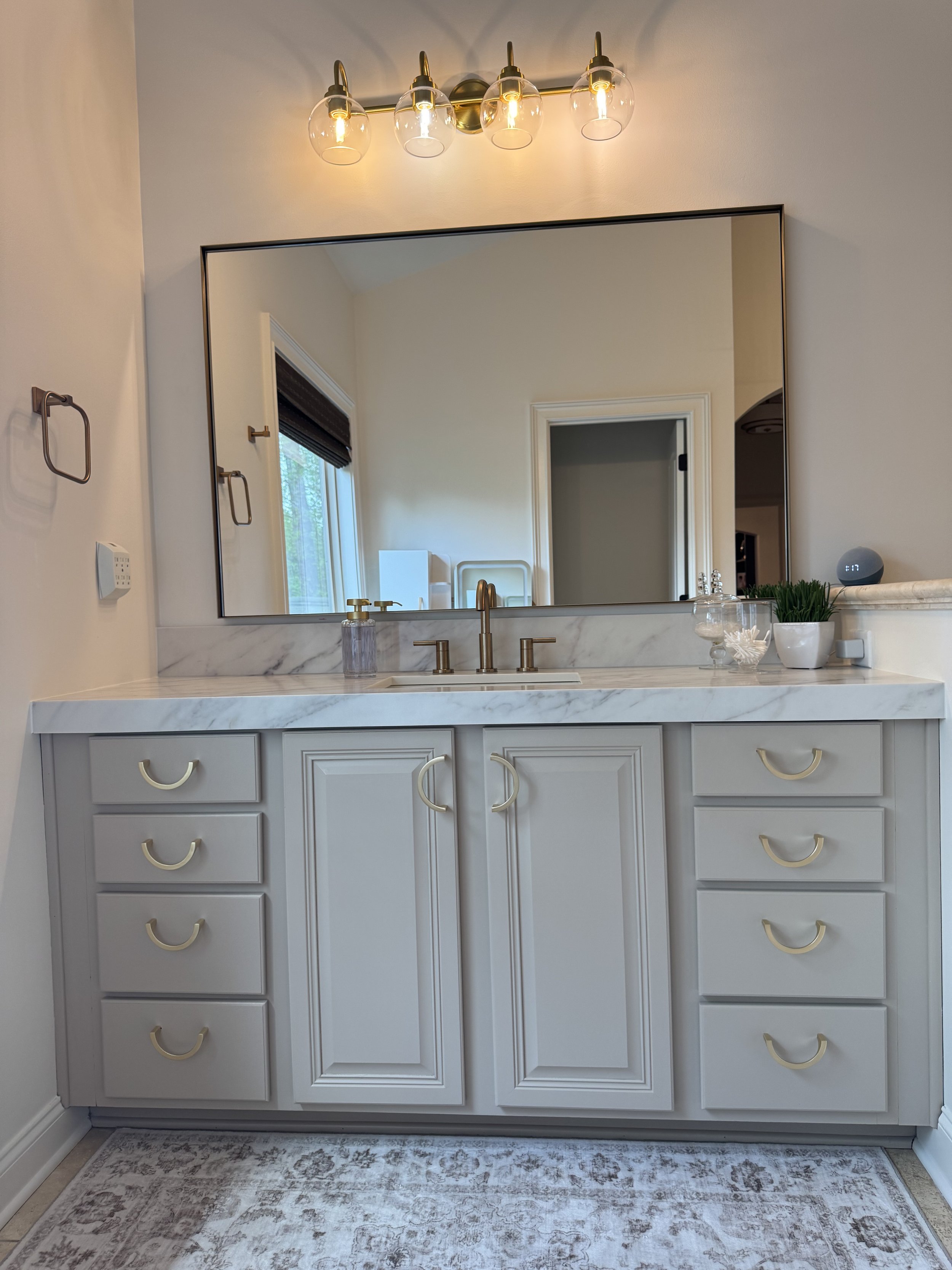 Bathroom remodel in Atlanta with white counter tops