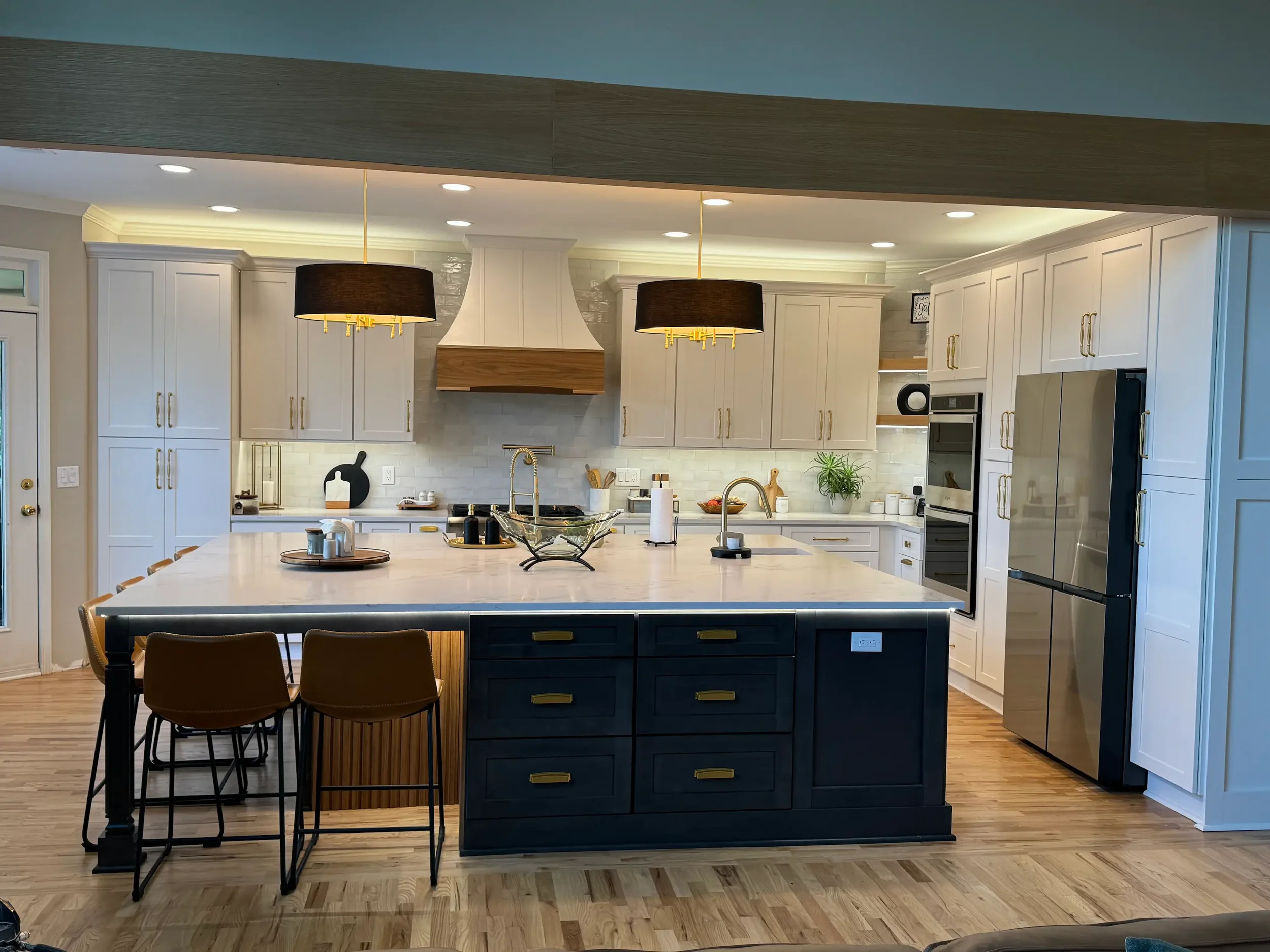 Stunning luxury kitchen remodel in North Atlanta with gold accents and new appliances