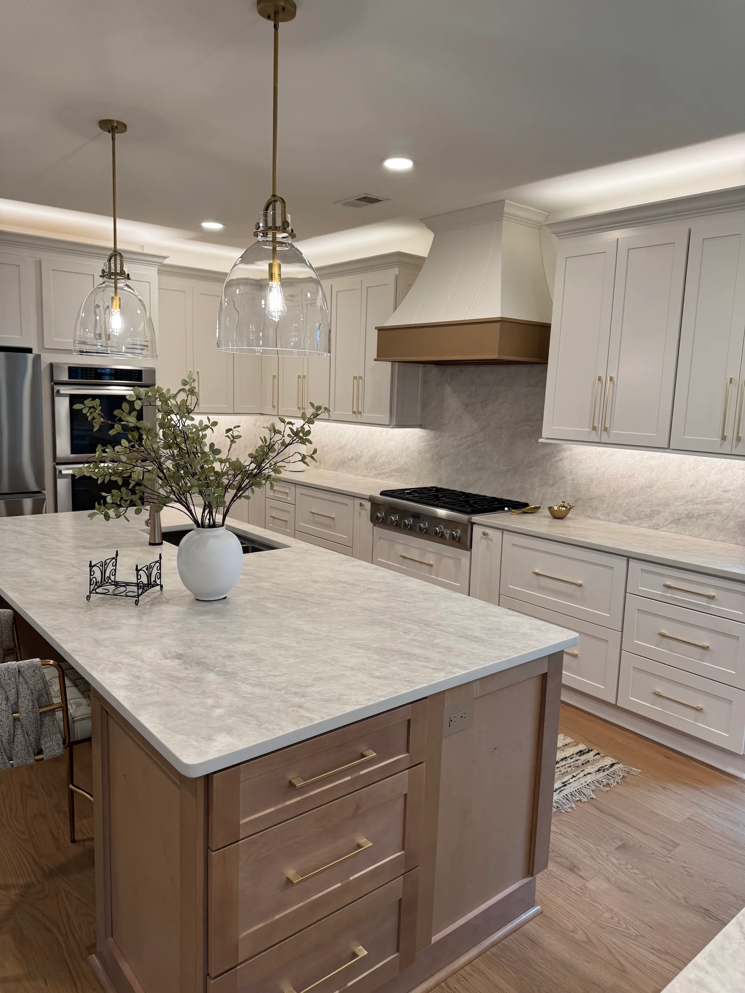 Vickery Cumming kitchen with quartz island and panel-ready fridge