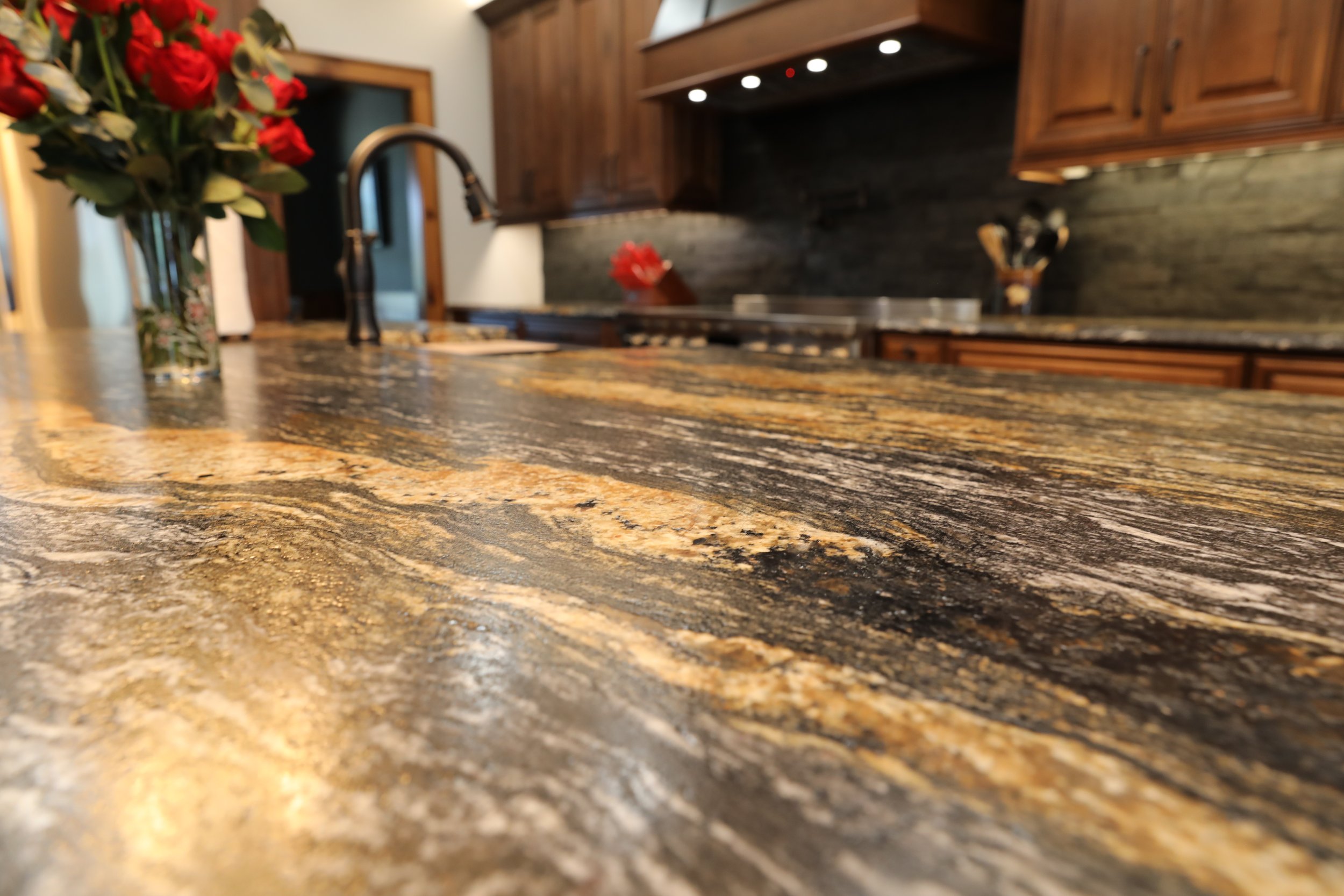 Closeup of North Atlanta kitchen remodel with dark marble countertops
