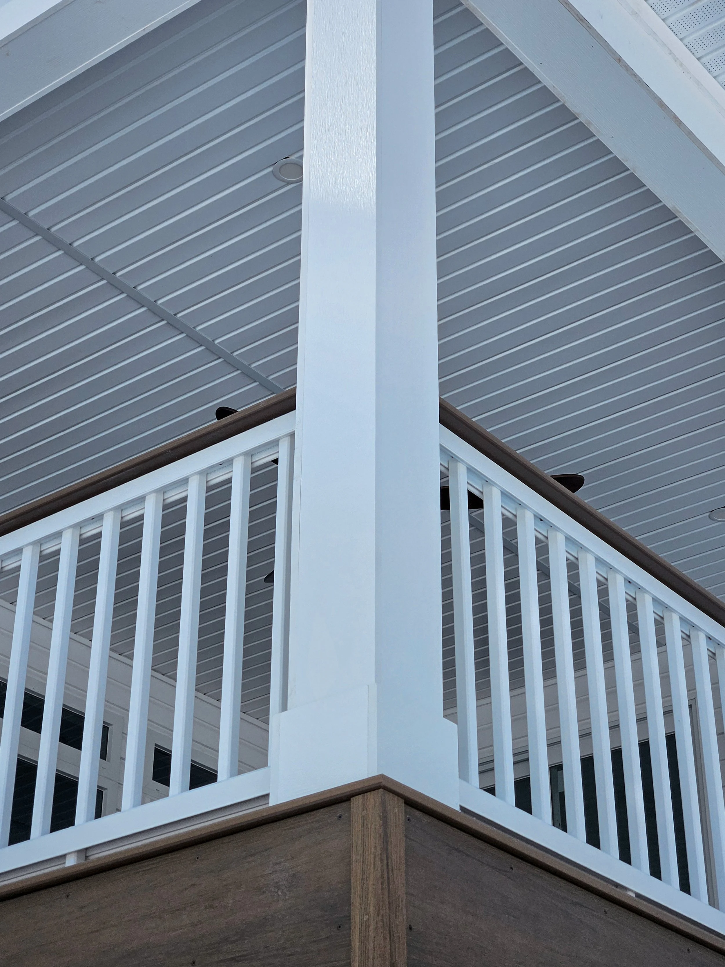 fairport-ny-azek-column-wrap-timbertech-rail-covered-deck.jpg