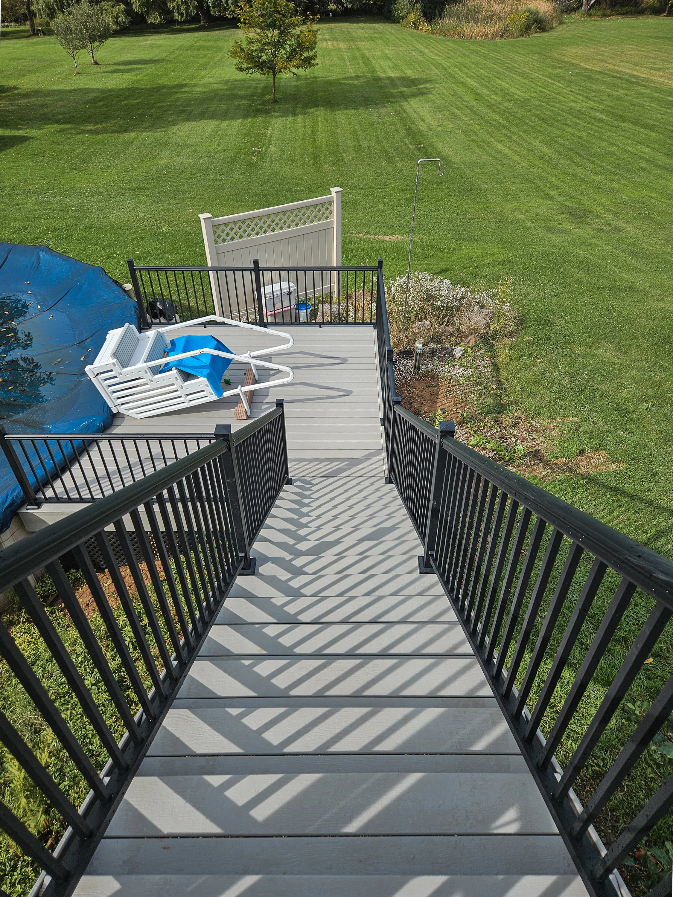 chili-ny-composite-deck-stairs-aluminum-railings-lakeside-decks.jpg