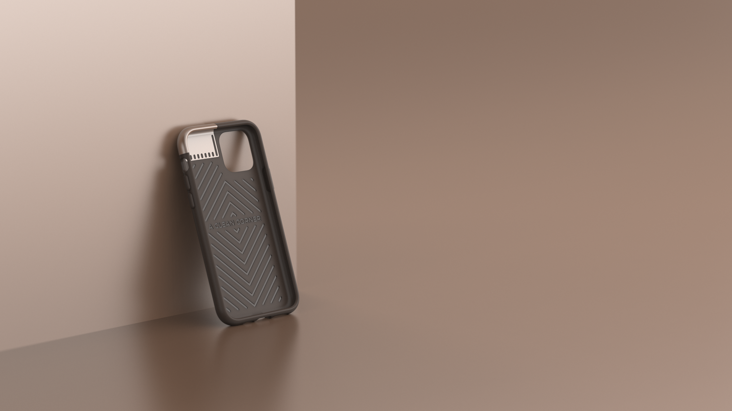 A smartphone case with a geometric pattern, leaning against a beige wall, with the words 'A CLEAN CORNER' engraved inside.