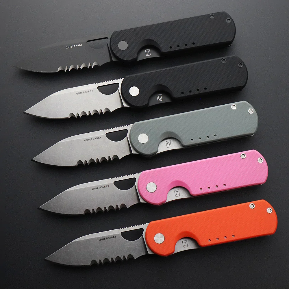 Five folding pocket knives with different color handles, arranged in a row on a black surface.