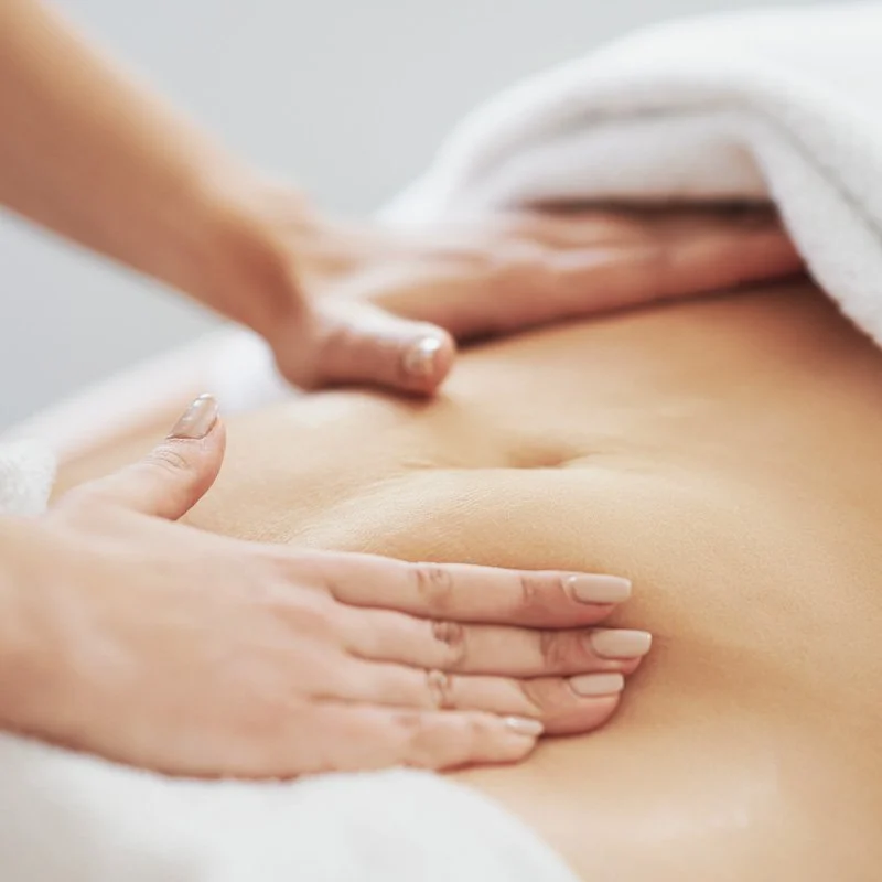 Woman receiving specialized brazilian massage at Naxaki Massage & Wellness in Naxos, Agios Georgios Beach