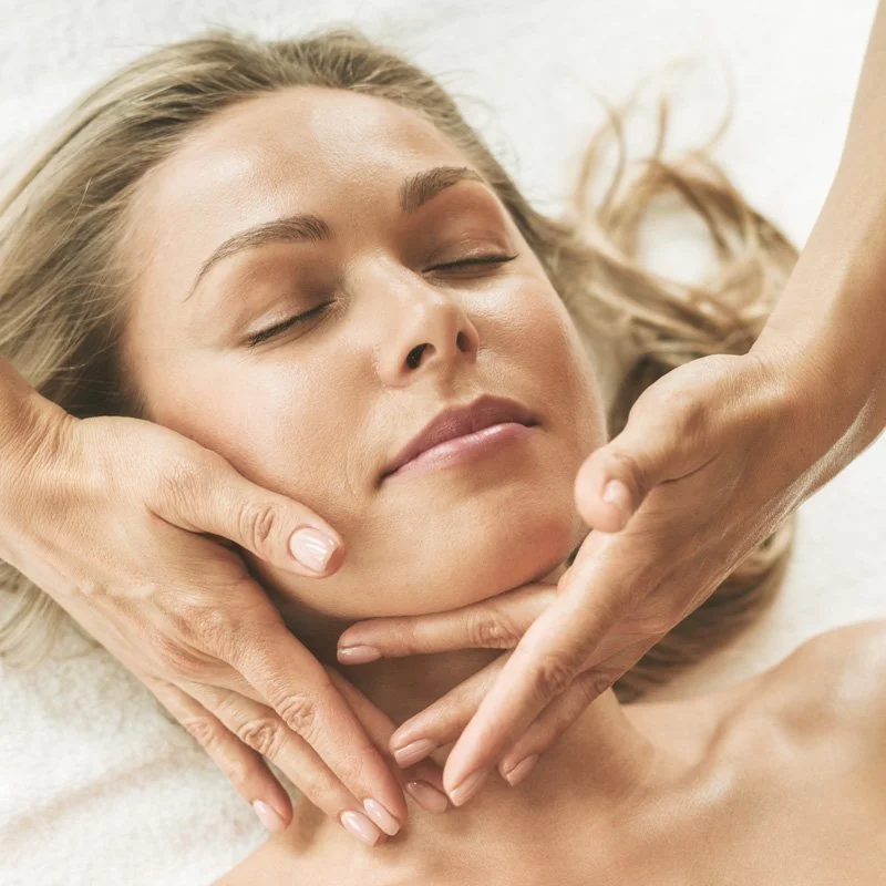 a woman receiving a specialized natural face lift massage part of naxaki's beauty treatments in Naxos