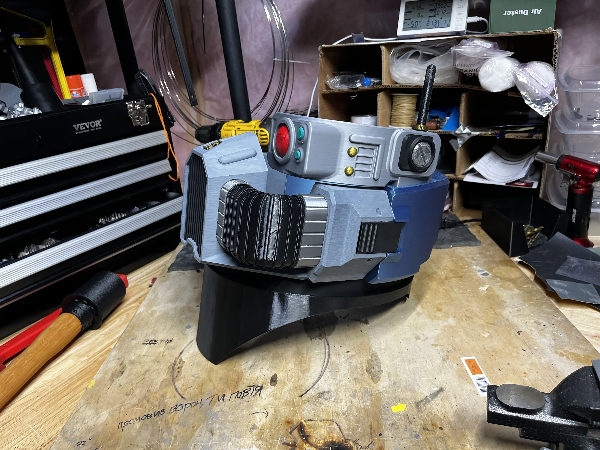 Modular grim dark 40k themed mask assembly from the side
