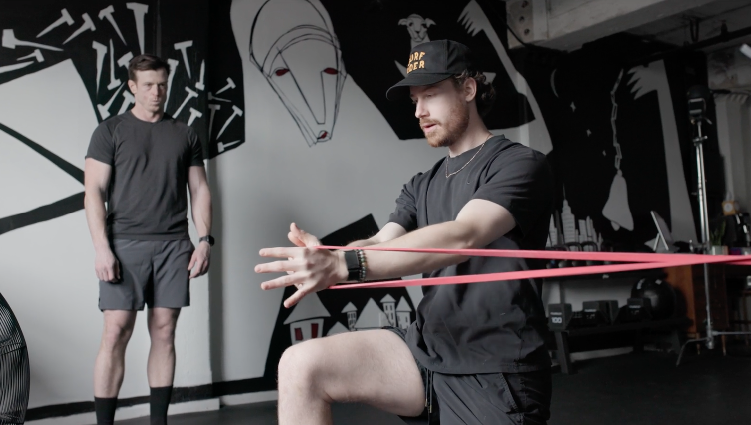 Miles Stevens is a greenpoint personal trainer thats working with a client on resistance training for performance and aesthetic goals