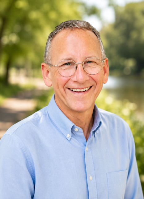 Professional headshot of Ronald, a Registered Psychologist providing therapy in Alberta
