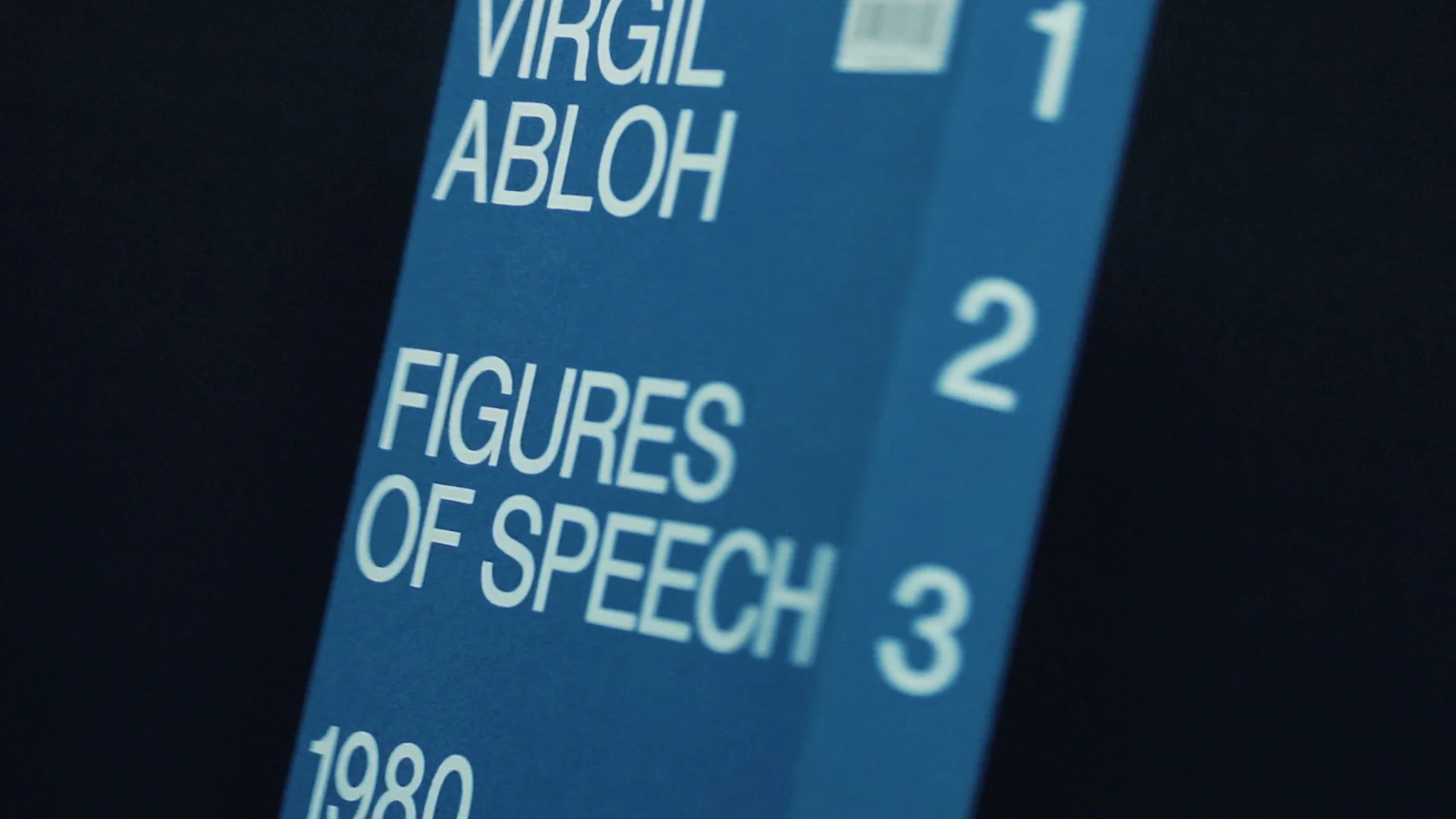 Copertina di un libro intitolato 'Figures of Speech' di Virgile Aloha, pubblicato nel 1980.