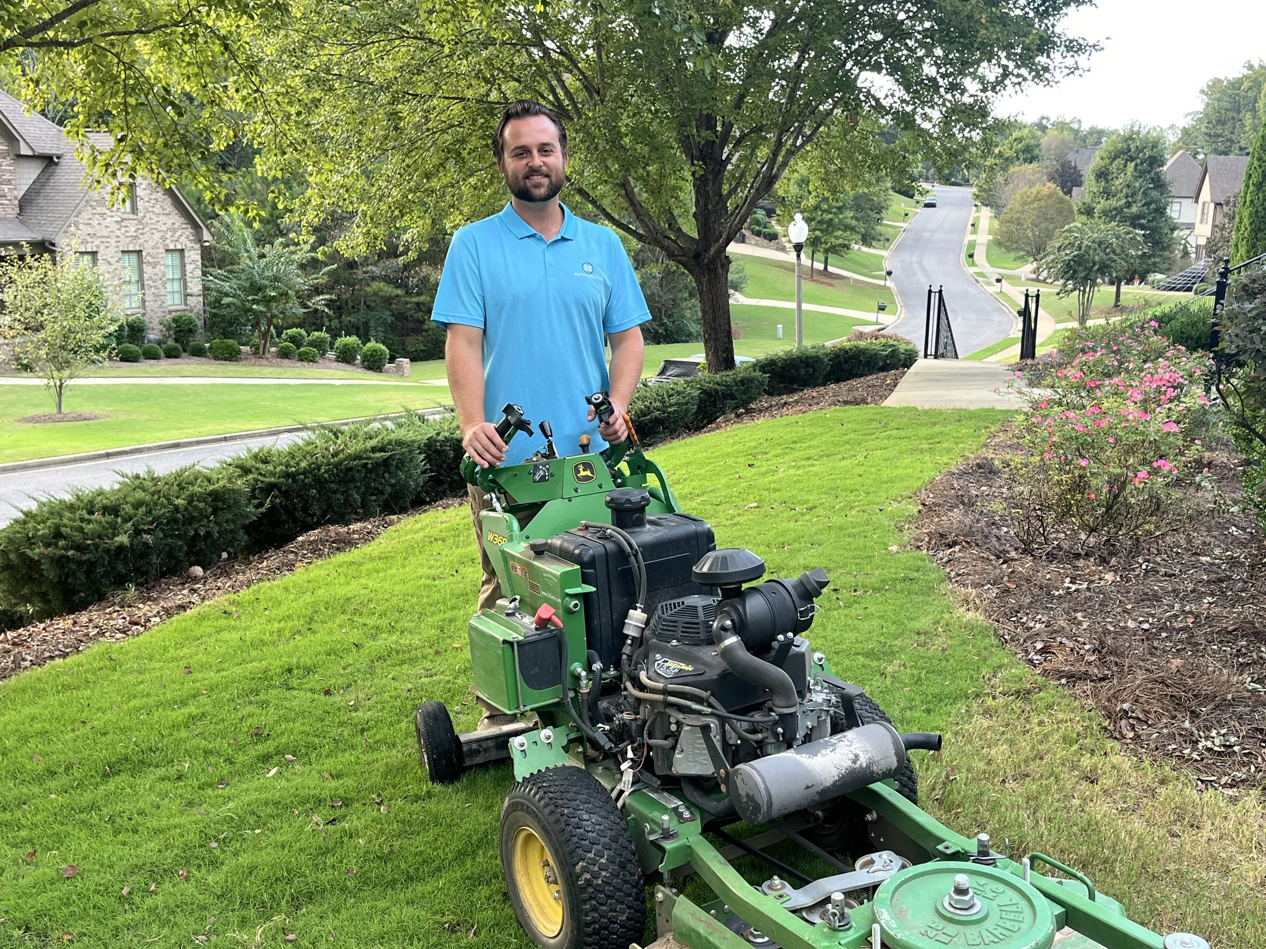 Mowing grass with John Deere mower