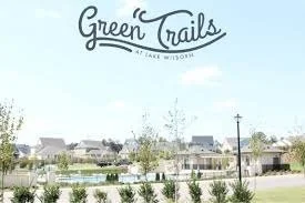 aerial view of green trails houses