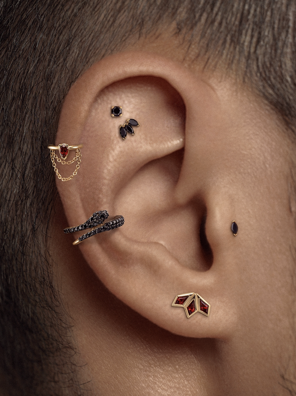 enigma-ear-curation-black-gold-bold-stack.png
