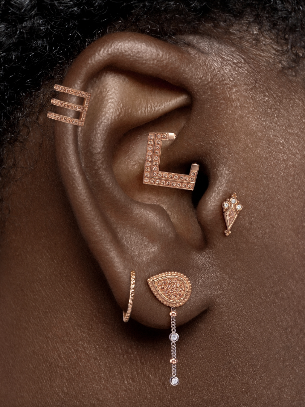enigma-ear-curation-gold-bold-stack.png