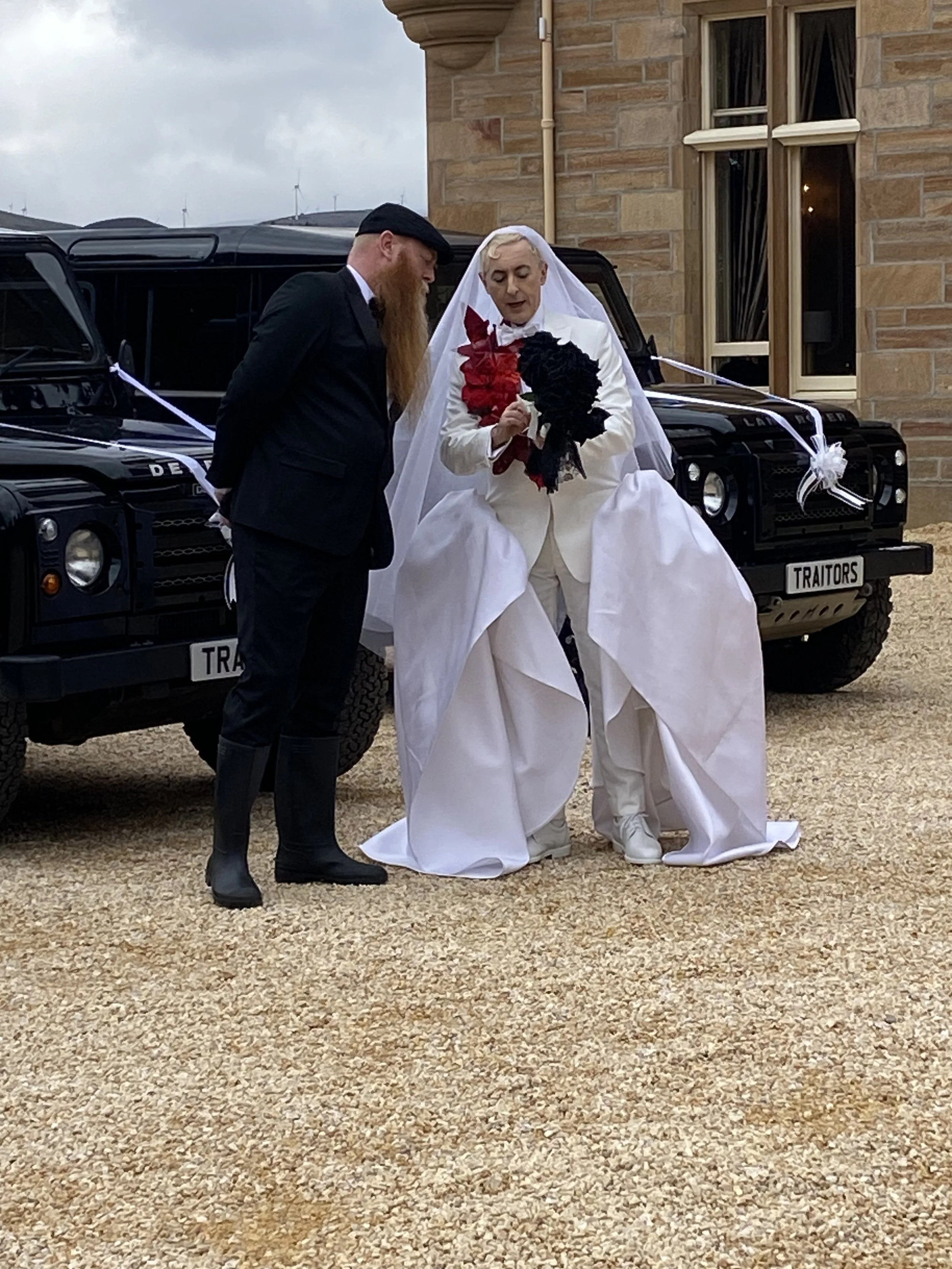 Alan explaining to me that I had to hand the flowers to him a certain way. Nobody else had thought to and made me look a proper idiot when we filmed it, Thankfully Alan is lovely and knew they never explained anything to me.