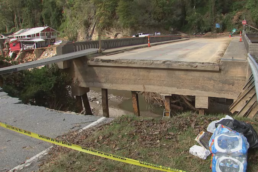 Makeshift pedestrian bridge is small mountain community’s only way in and out