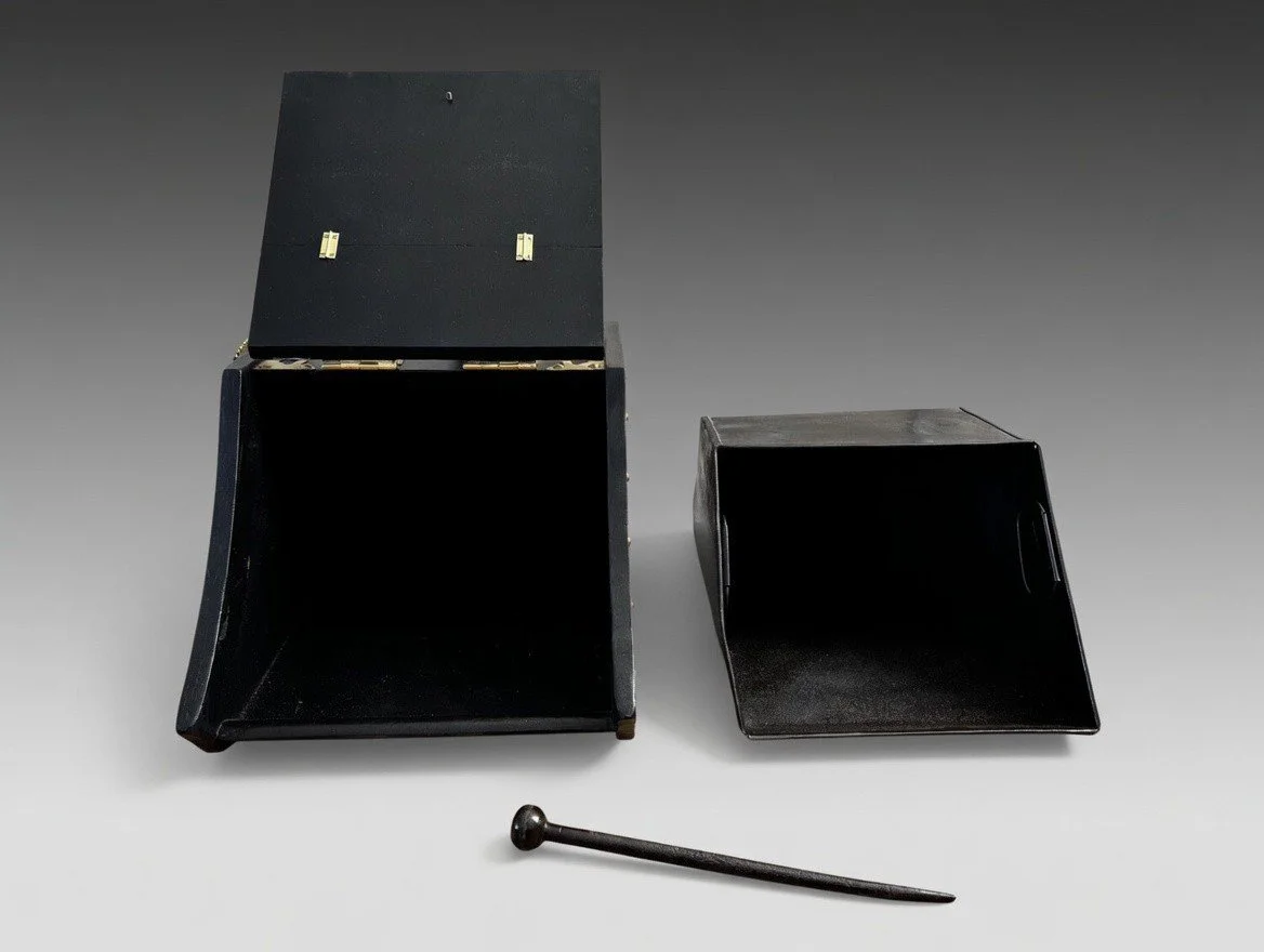 coal scuttle interior with removable liner showing angled construction