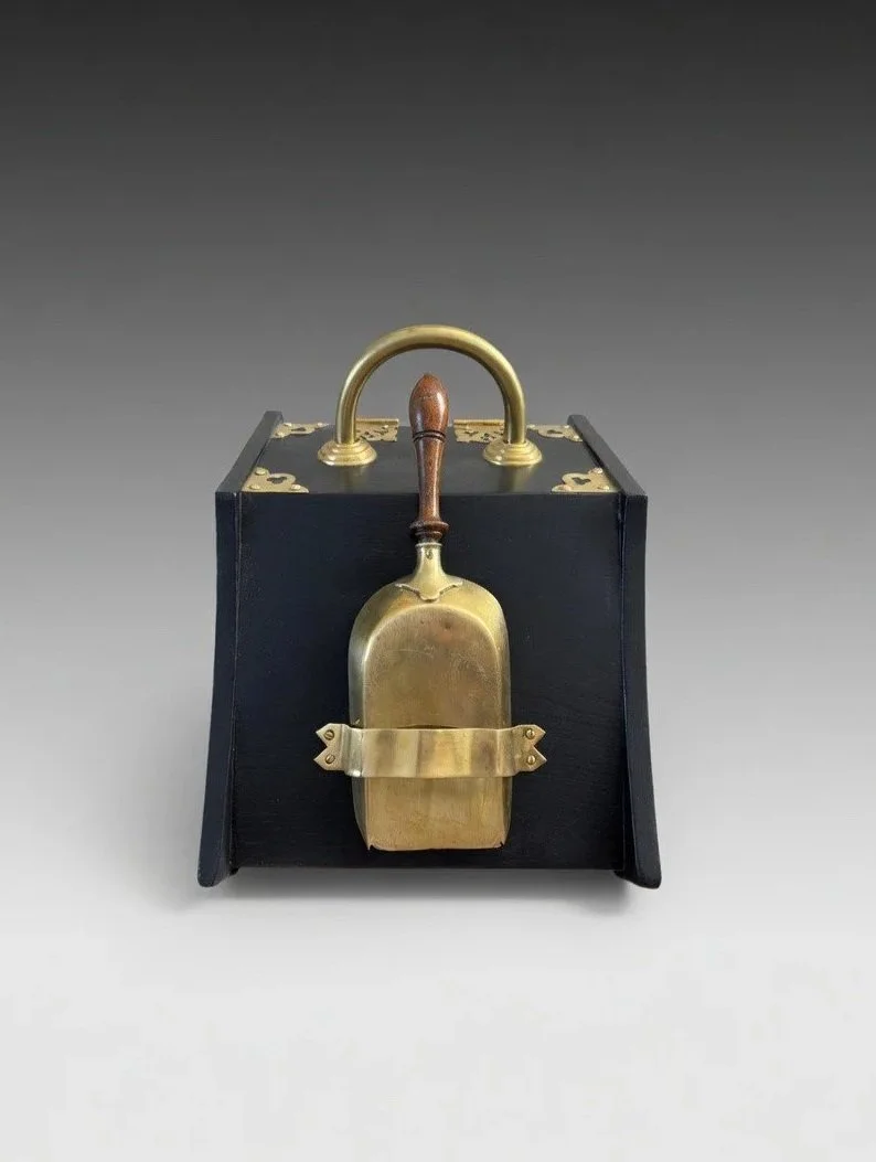 antique coal scuttle in black with brass hardware, back view