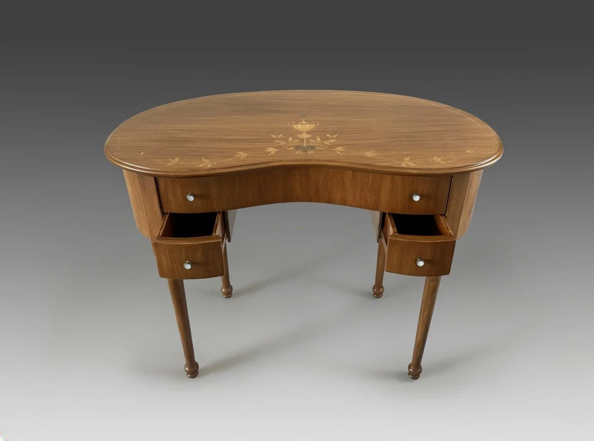 Kidney-shaped writing desk with both lower drawers open, showing the fitted drawer interiors