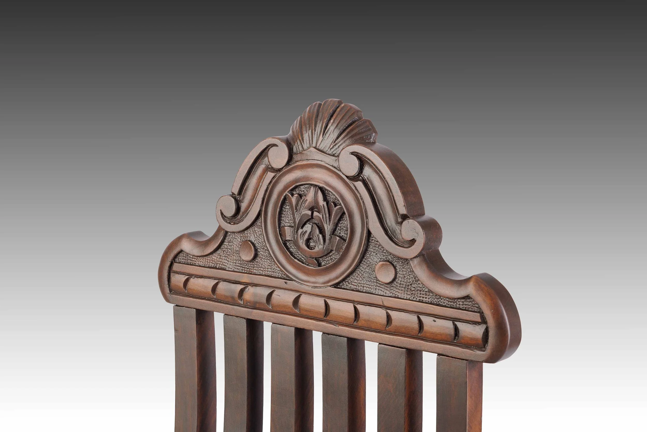 Matched pair of 19th-century Italian Renaissance Revival chairs in sculptural sedia tenaglia form with curved slats and carved backrests, restored by Acanthus Home