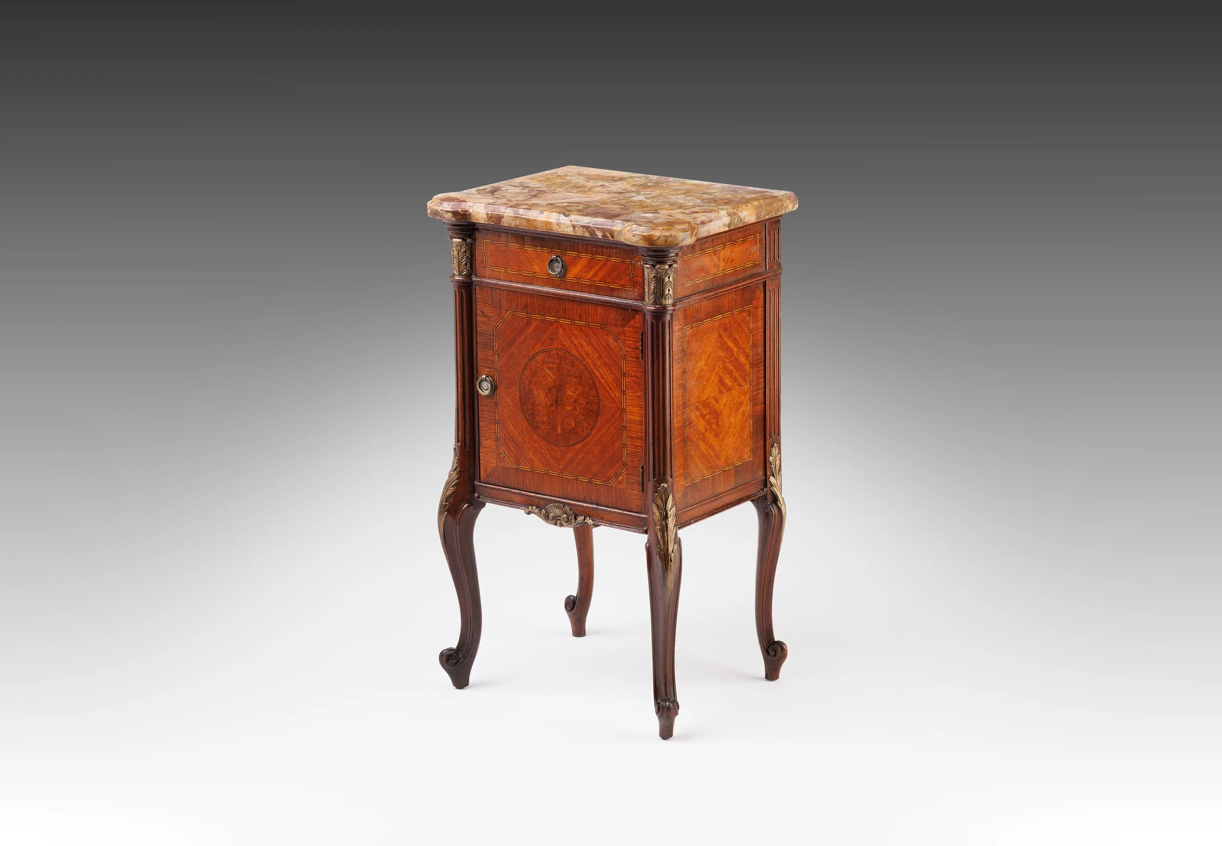 Late nineteenth-century marble-top side table in walnut attributed to France, with a floral marquetry door and cabriole legs.
