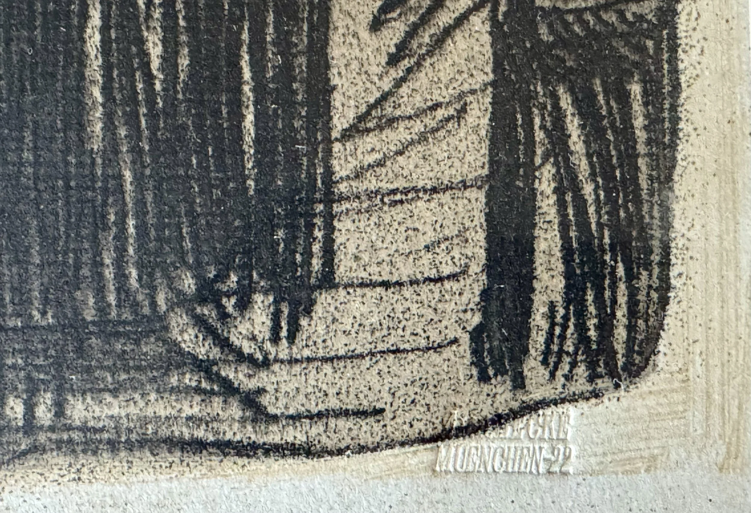 Embossed publisher's blindstamp reading München 22 at the lower edge of the Kollwitz Hamburg Tavern reproduction. Caption: The embossed publisher's blindstamp, "… München 22," evidence of issuance through a Munich publisher.