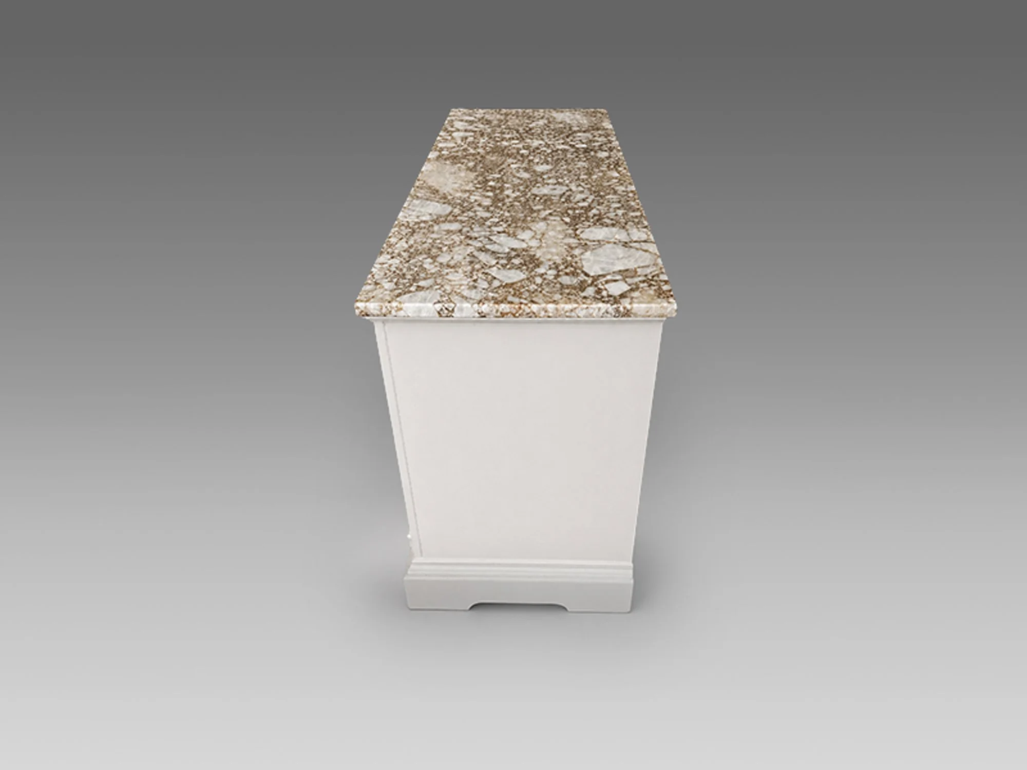 Side view of painted antique cabinet with fitted stone top, paneled construction, carved detailing, and early twentieth-century European revival form