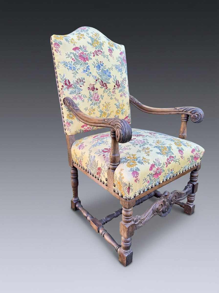 The Solstice Crest antique armchair before reupholstery, the carved oak frame in its cleaned finish