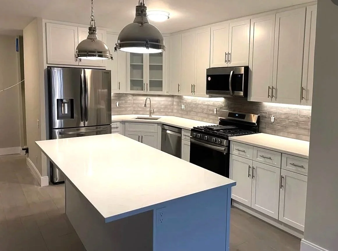 Close up: Complete Kitchen Renovation and living room in small space to create an open feel, and functional living space.