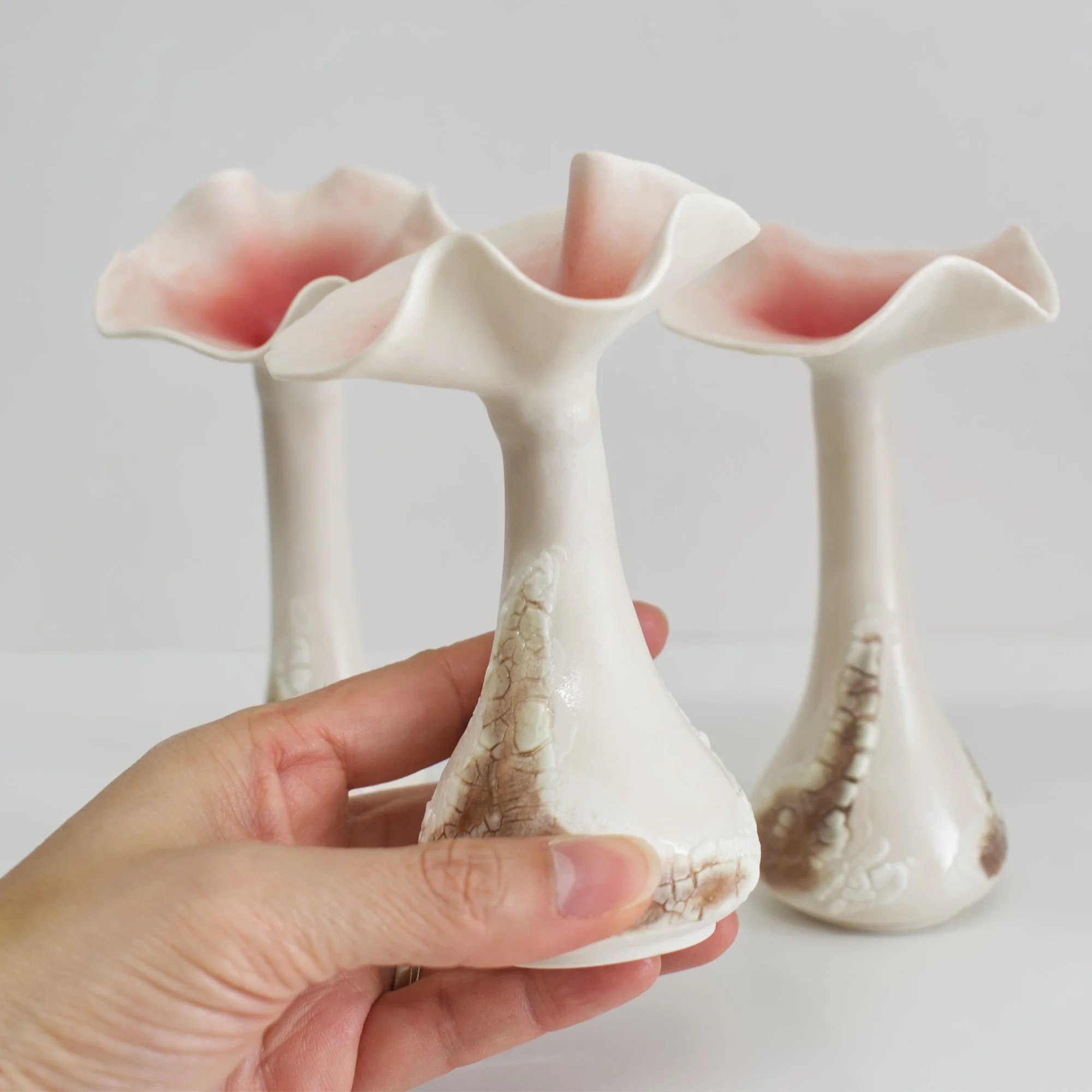 Fluerette bud vase_stalk group in hand.jpg