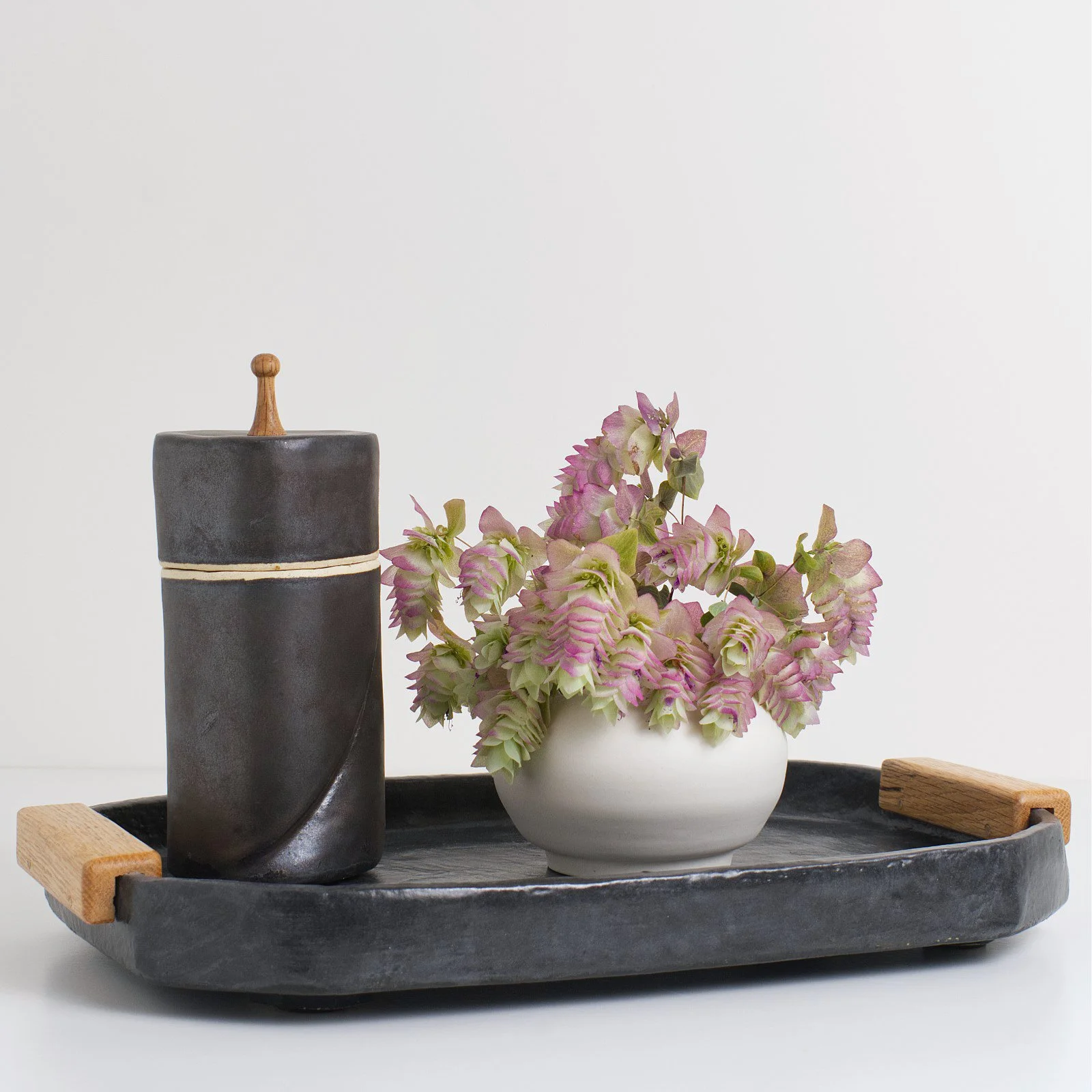Noir tray bronze lidded jar.jpg