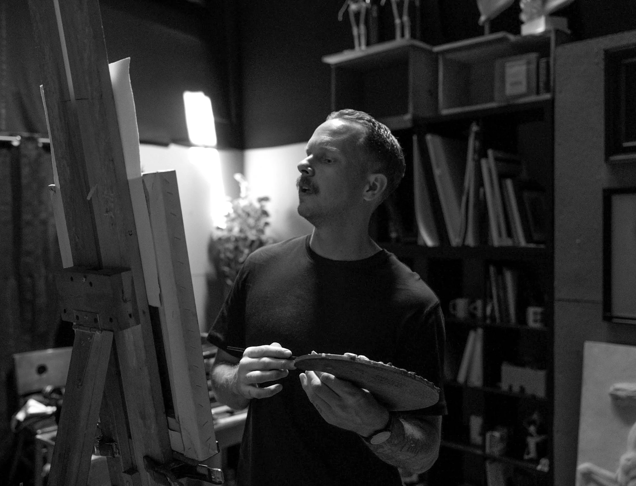 Artists and instructor Scott Garder at work in his studio.