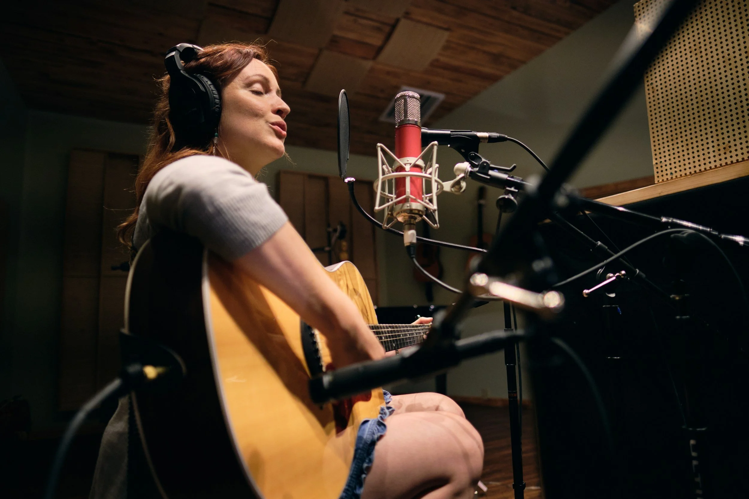 Singer-songwriter recording original music as part of long-term catalog development.