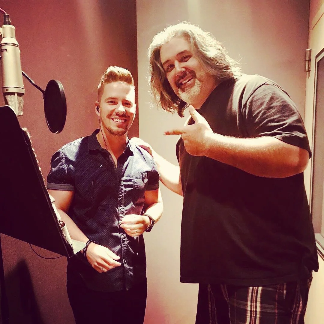 artist recording vocals with producer in Nashville studio